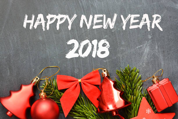 istock Happy new year 2018 on blackboard with Christmas decoration 842786190