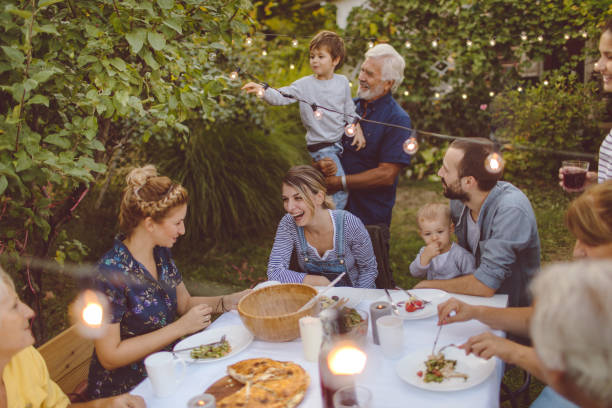 istock Multi-generation family at a dinner party 842789610