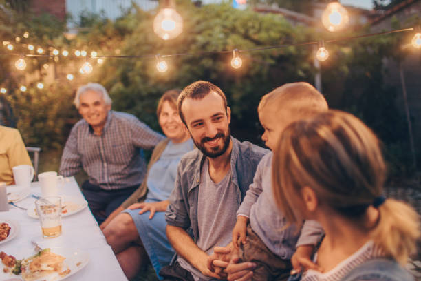 istock Multi-generation family at a dinner party 842793360