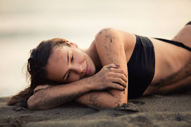 istock Beautiful woman on the beach 842801170
