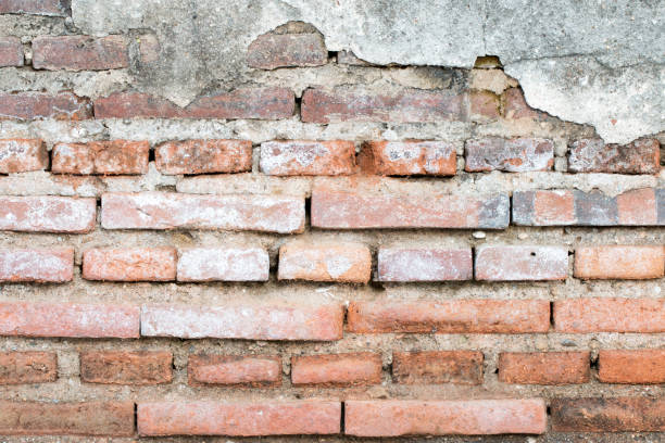 istock cracked concrete vintage brick wall background 842801194