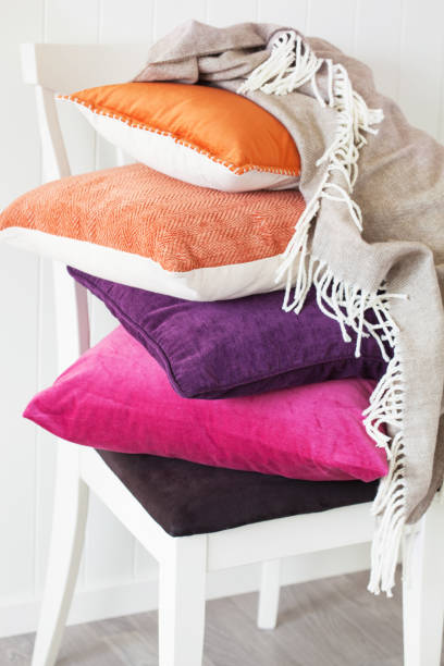 istock colorful cushions throw cozy home autumn mood 842805724