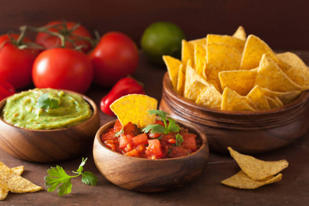 istock mexican guacamole and salsa dip, nachos tortilla chips 842814082