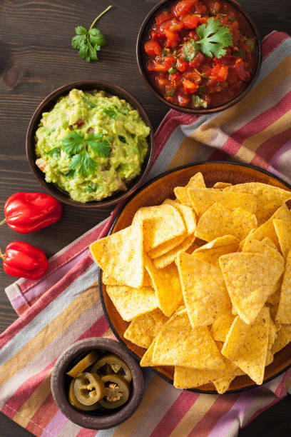 istock mexican guacamole and salsa dip, nachos tortilla chips 842814252