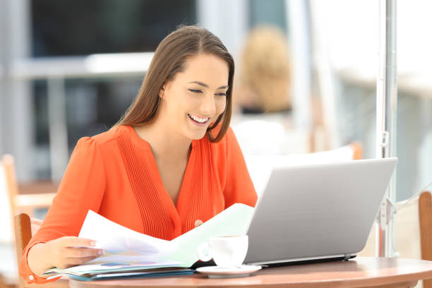 istock Happy entrepreneur working on line in a coffee shop 842817648