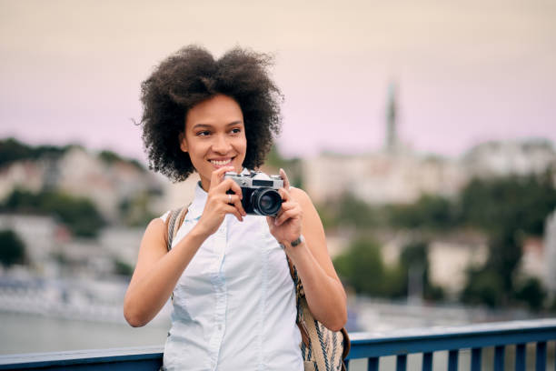 istock Mixed race tourist taking a photo 842819420
