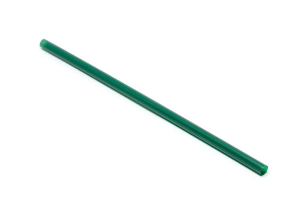 istock Straws in a green and white background. 842825446
