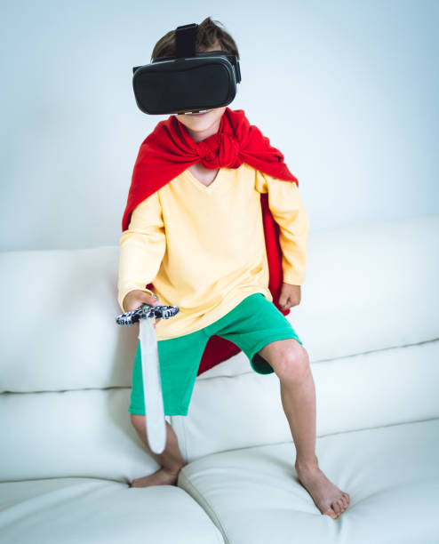istock Young boy play the video game with Virtual Reality 842825832