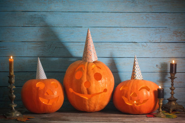 istock halloween pumpkin on blue wooden background 842826428