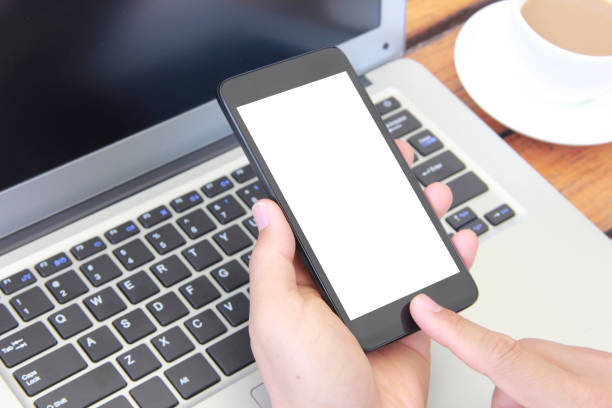 istock Male hand holding blank mobile phone 842836874