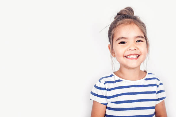 happy small girl - shirt lifestyles close up cheerful imagens e fotografias de stock
