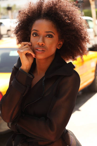 istock American beauty with curly hair. 842840204