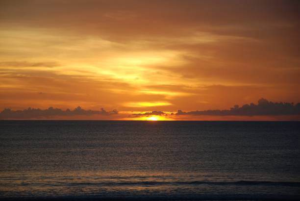 istock sunset view of a beach in bali, indonesia 842840732