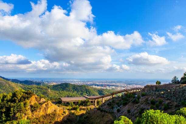 Santa Creu mountain views. The llobregat valley and fan delta in the further side of the image. Collserola mountain Range landmark.