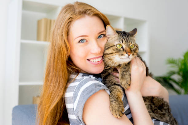 istock Woman with a cat 842845416