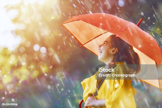 Child Under Autumn Rain Stock Photo - Download Image Now - Rain, Child, Umbrella