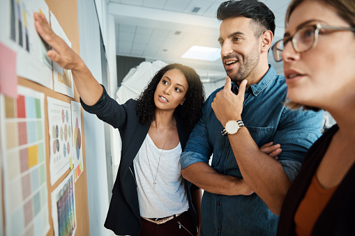 Shot of a group of colleagues having a brainstorming session in a modern office