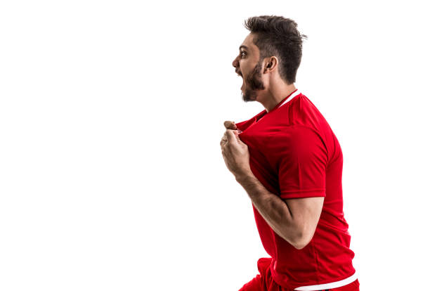 istock Fan / Sport Player on red uniform celebrating on white background 842857828