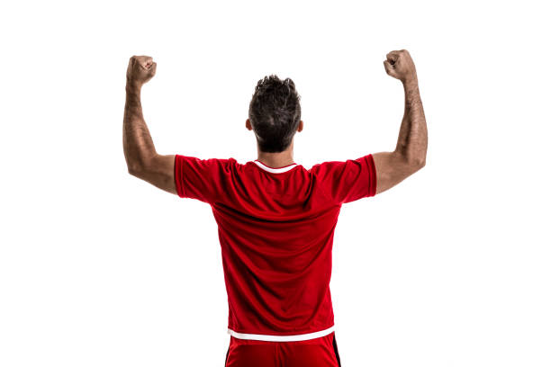 istock Fan / Sport Player on red uniform celebrating on white background 842857832