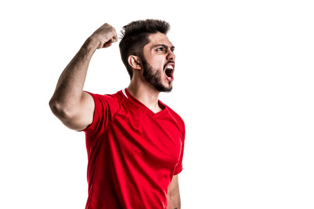 istock Fan / Sport Player on red uniform celebrating on white background 842857844