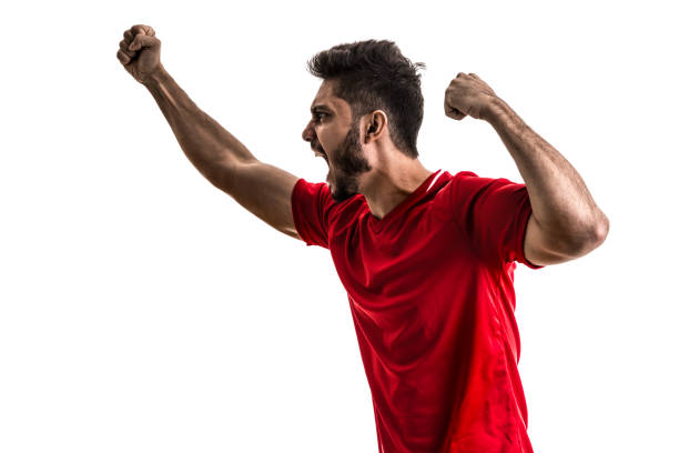 istock Fan / Sport Player on red uniform celebrating on white background 842857846