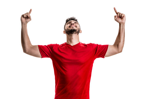 istock Fan / Sport Player on red uniform celebrating on white background 842857848