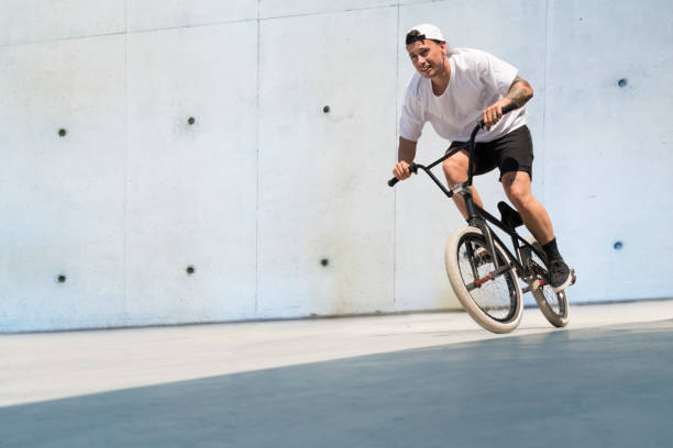 istock Young BMX bicycle rider 842859040