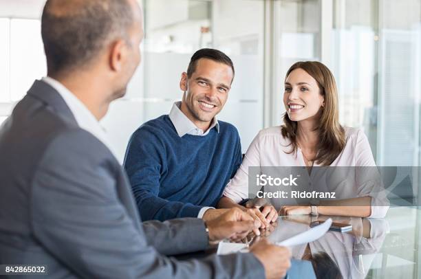 Businessman With Customers Stock Photo - Download Image Now - Financial Advisor, Advice, Customer