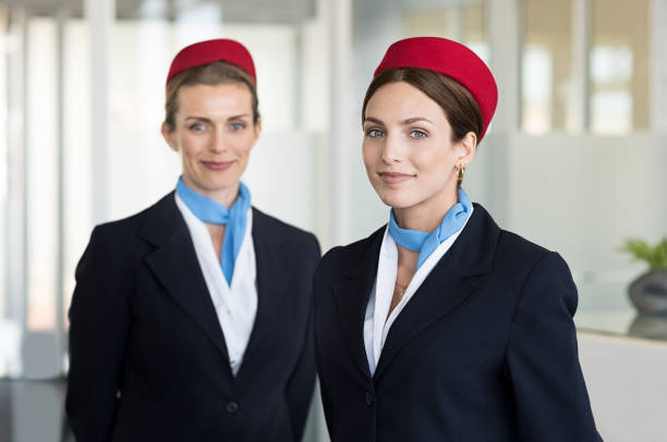 istock Smiling hostess at airport 842865214