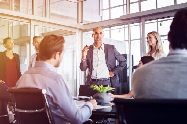 istock Businessman talking in meeting 842868292