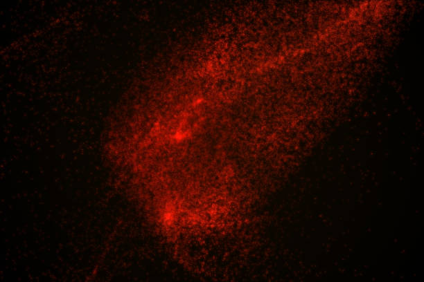 istock Abstract background made of red glowing particles 842868540