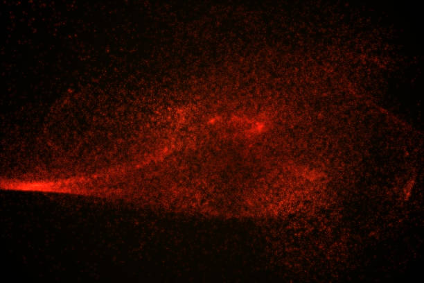 istock Abstract background made of red glowing particles 842868744