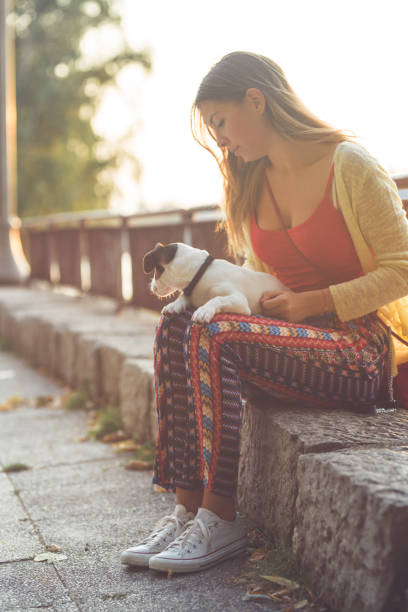 istock Young woman and her puppy 842878798
