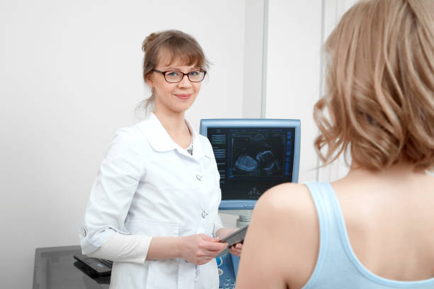 istock Beautiful young woman visiting doctor 842882124