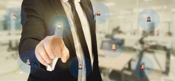 istock Businessman touches his staff with his finger 842882404