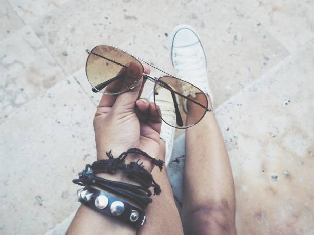 Selfie of sun glasses on hand