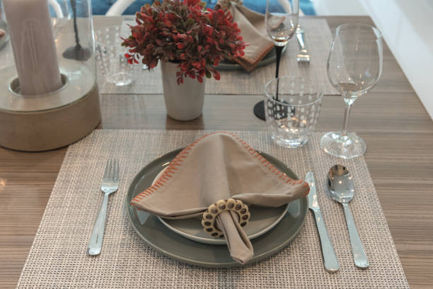 istock table set on wooden dining room 842887092