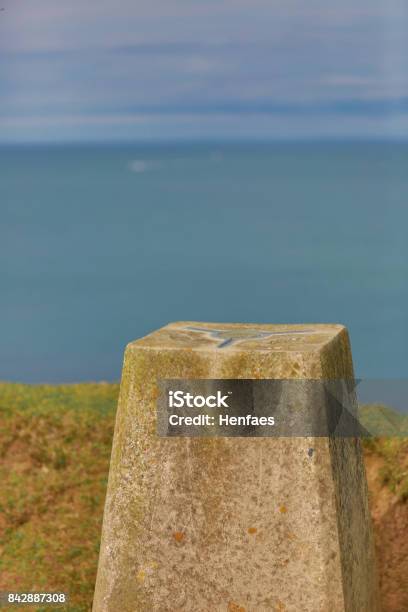 Triangulation Survey Pillar On The Coast Overlooking The Sea Stock Photo - Download Image Now