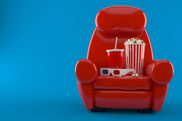 istock Armchair with popcorn and soda 842891500