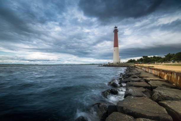 istock Barnegat Lighthouse, New Jersey seen from the beach 842897436