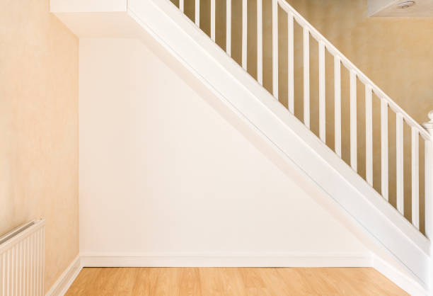istock Newly decorated wall under staircase in a domestic room. 842897746