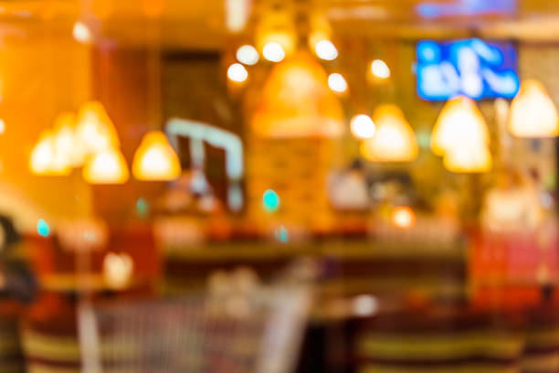istock Blur coffee shop or cafe restaurant with abstract bokeh light image background. For create montage product display 842899486