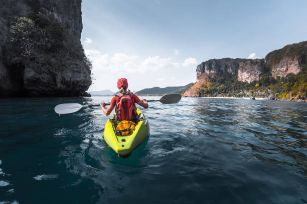 istock Woman paddles kayak 842903920