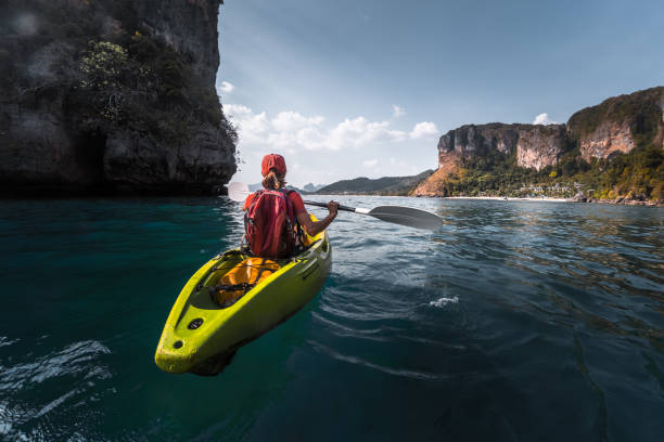 istock Woman paddles kayak 842903992