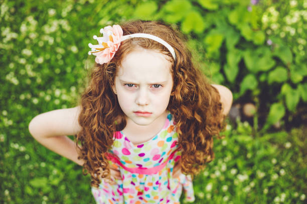 istock Emotional princess girl with angry expression on face. 842906494