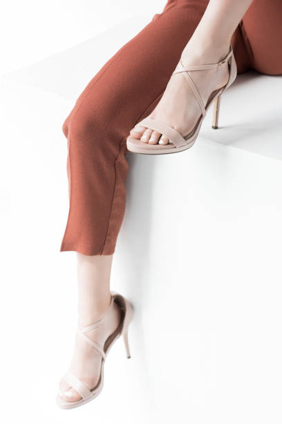 istock trendy woman in heels 842907618