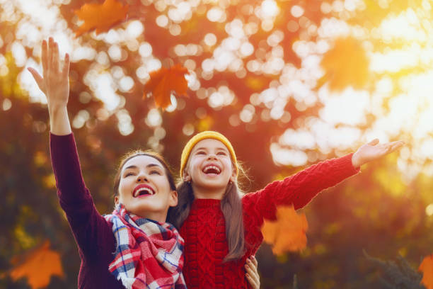 istock family on autumn walk 842907682