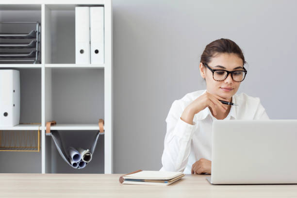 istock Young business woman working 842910044