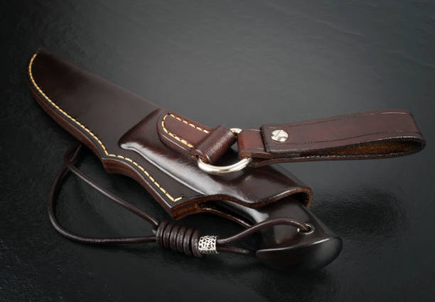 istock hunting knife handmade on a black background. Leather Sheath Handmade 842915700