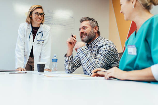 istock Medical team interacting at a meeting in boardroom 842921128